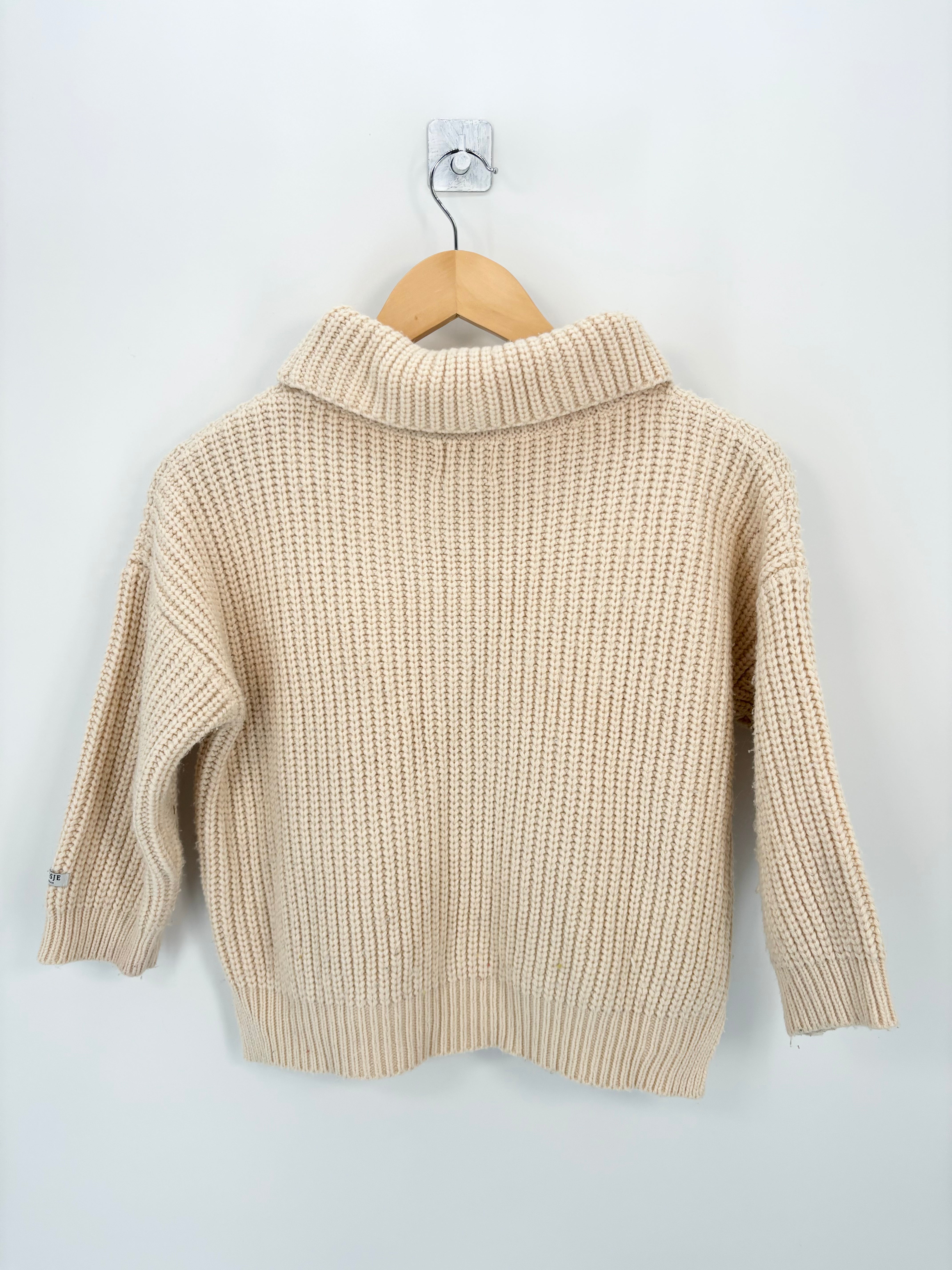 Donsje - Pull maille col roulé beige imparfait T.5/6 ans