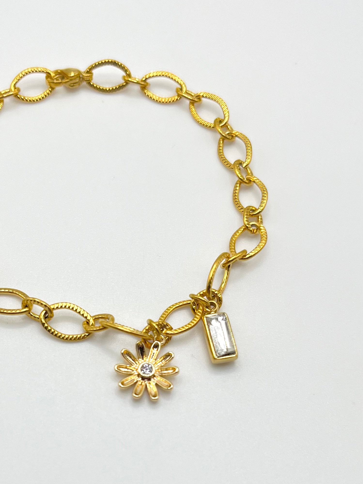 Horizon & Joyas - Bracelet breloque fleur 72